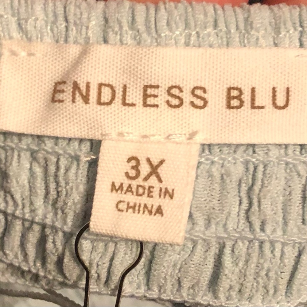 Boutique baby blue dress with puffed sleeves and cross-criss back. Adorable! - Picture 6 of 6